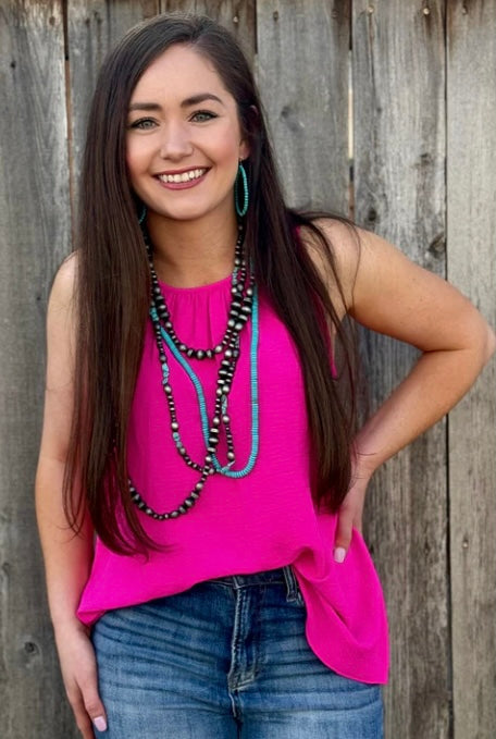 VICKY SLEEVELESS FUCHSIA TOP