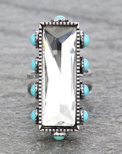 OBLONG TURQUOISE AND CLEAR STONE RING